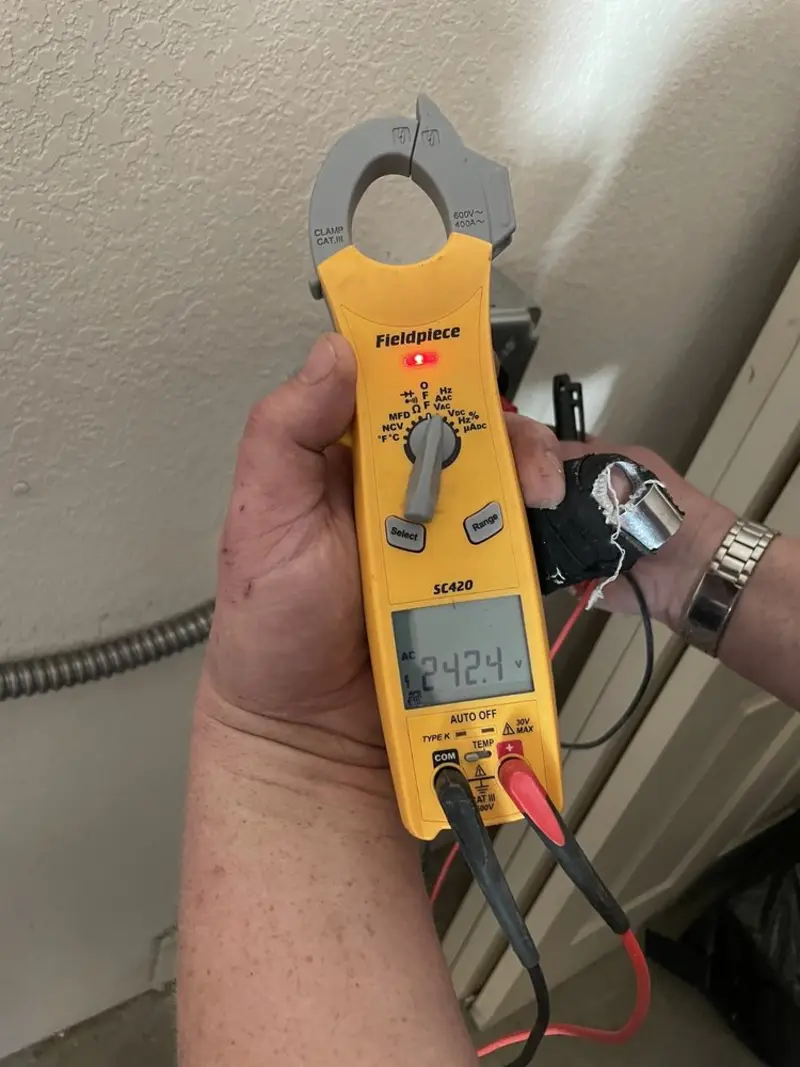 Voltage testing with clamp meter during Generator Installation in Berkeley